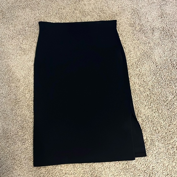 Ann Taylor Dresses & Skirts - Ann Taylor black pull on skirt. Side slit. Medium.